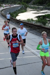 Utah Valley Marathon Man and Woman Running near river